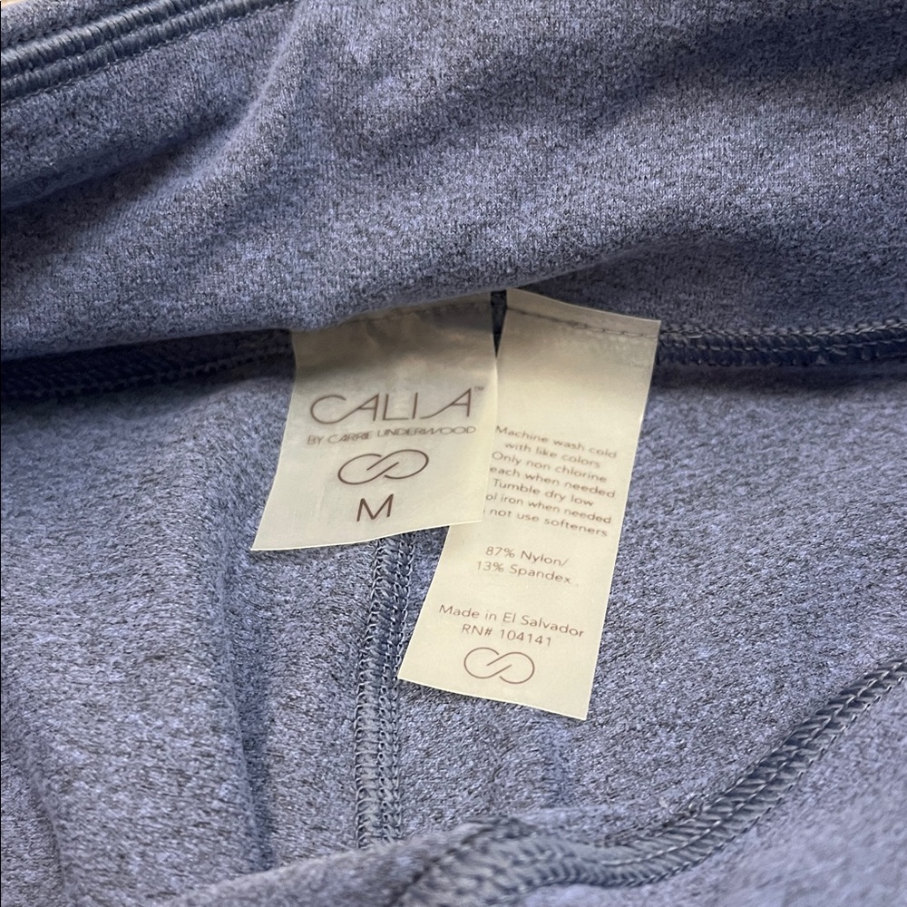 Calia Blue Leggings. Body freeze fabric. Front zip waist pocket.NWT. Size medium - Picture 5 of 7